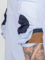 Yellow Skin Camisa Estructura Celeste detalle Codera